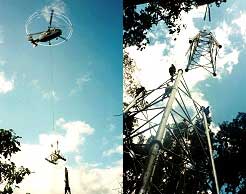 Teile einer Seilbahn werden von einem Helikopter in australischen Regenwald eingeflogen. Mehr? Hier klicken!